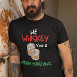 La mejor camiseta para esta Navidad, We Whiskey you a Merry Christmas T-Shirt Printify Black L 