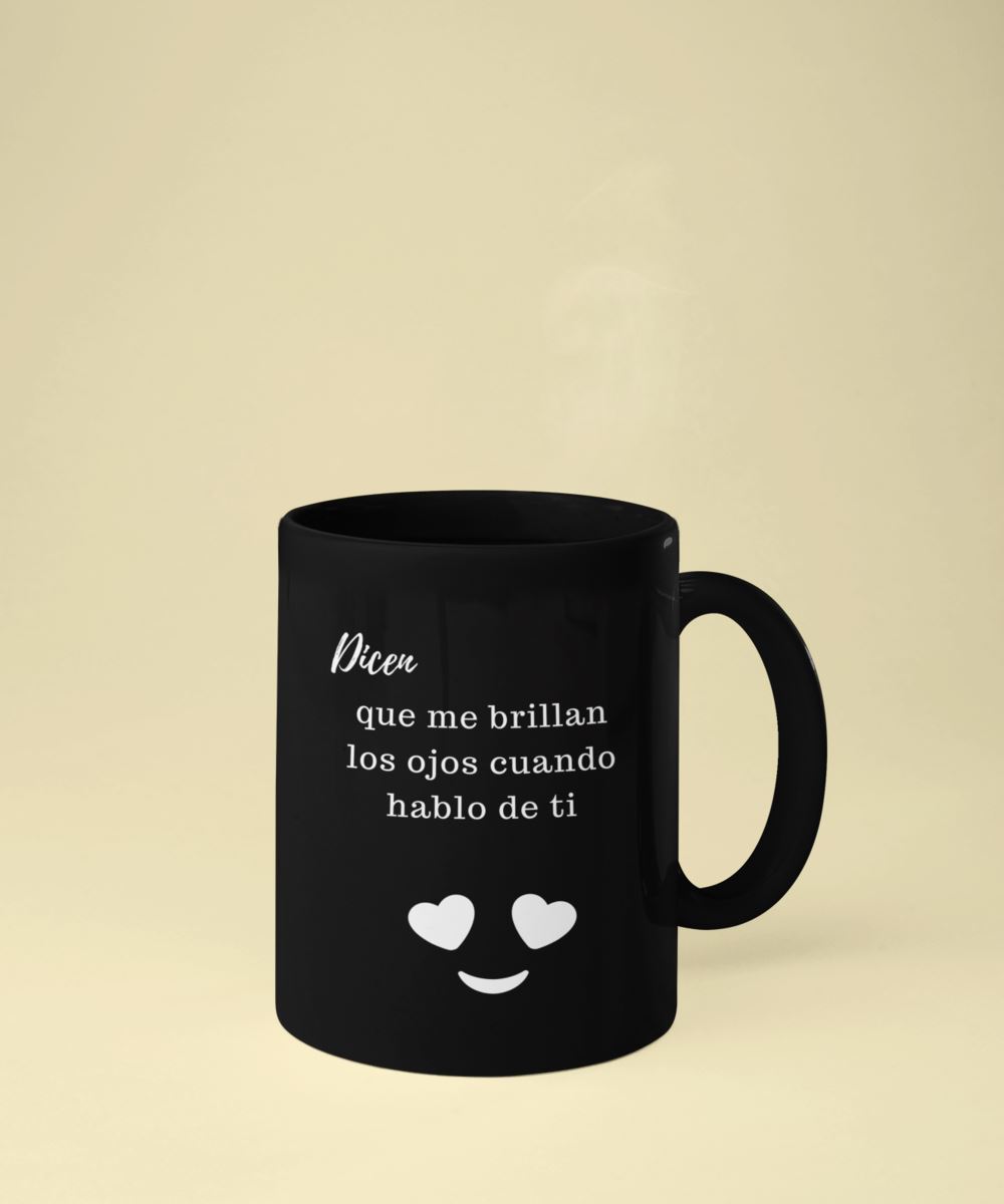 Taza Negra con mensaje de amor: Dicen… que me brillan los ojos cuando hablo de ti! Coffee Mug Regalos.Gifts 